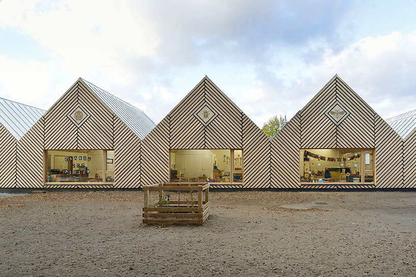 this school in perthes-en-gâtinais comprises multiple gabled wooden volumes - 6