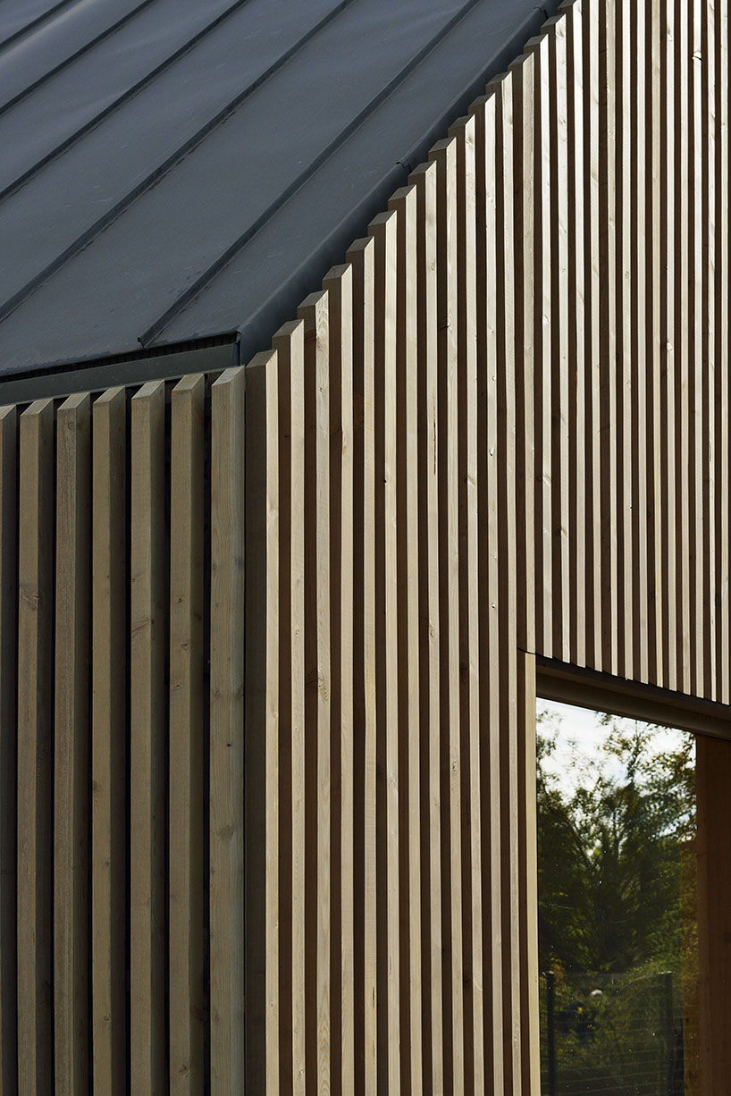 this school in perthes-en-gâtinais comprises multiple gabled wooden volumes - 11