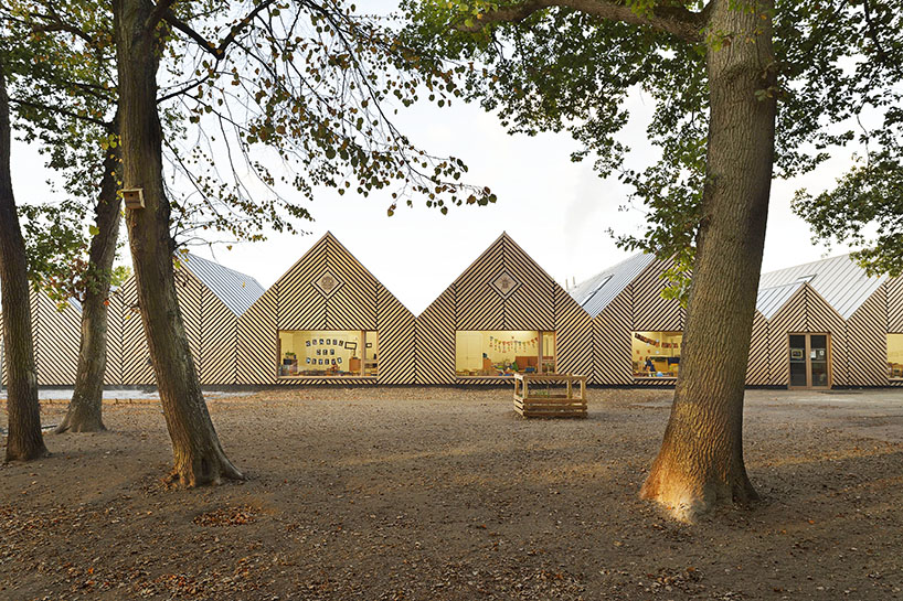 this school in perthes-en-gâtinais comprises multiple gabled wooden volumes - 4