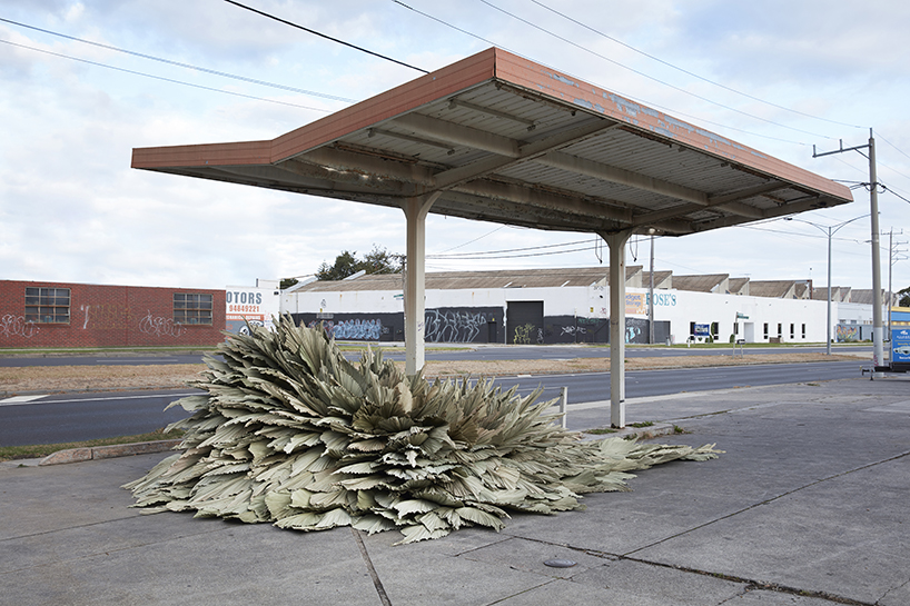 loose leaf studio takes over a disused petrol station with botanical installation designboom