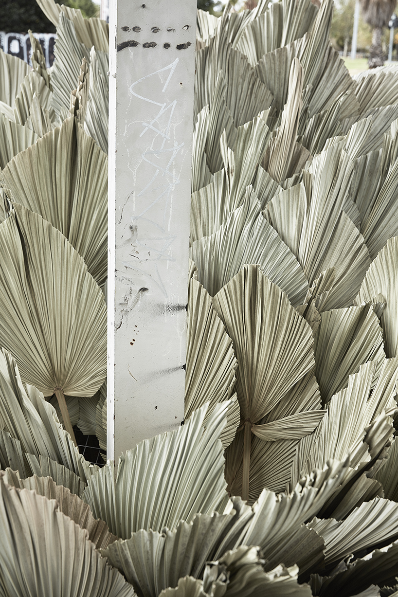 loose leaf studio takes over a disused petrol station with botanical installation designboom