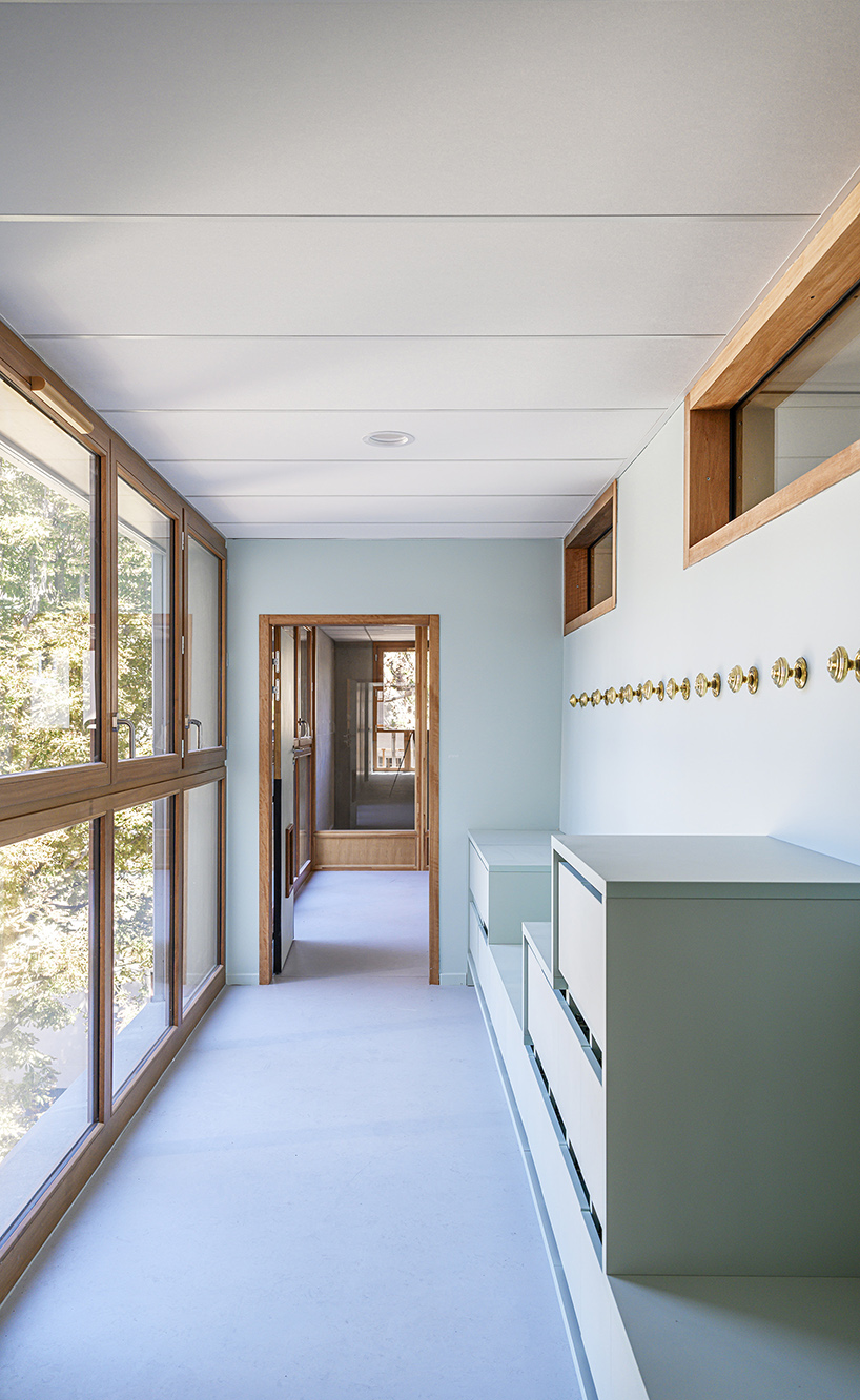 BFV architectes designs 'crèche justice' in paris using recycled door frames designboom