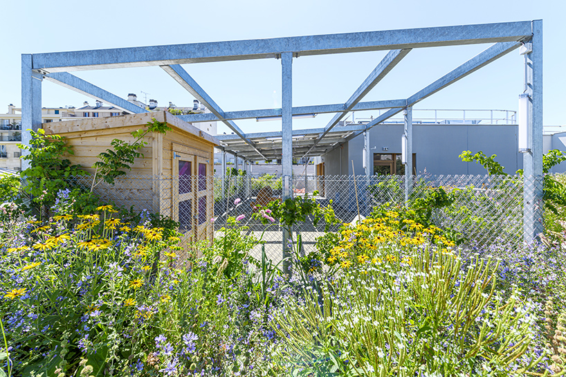 BFV architectes designs 'crèche justice' in paris using recycled door frames designboom