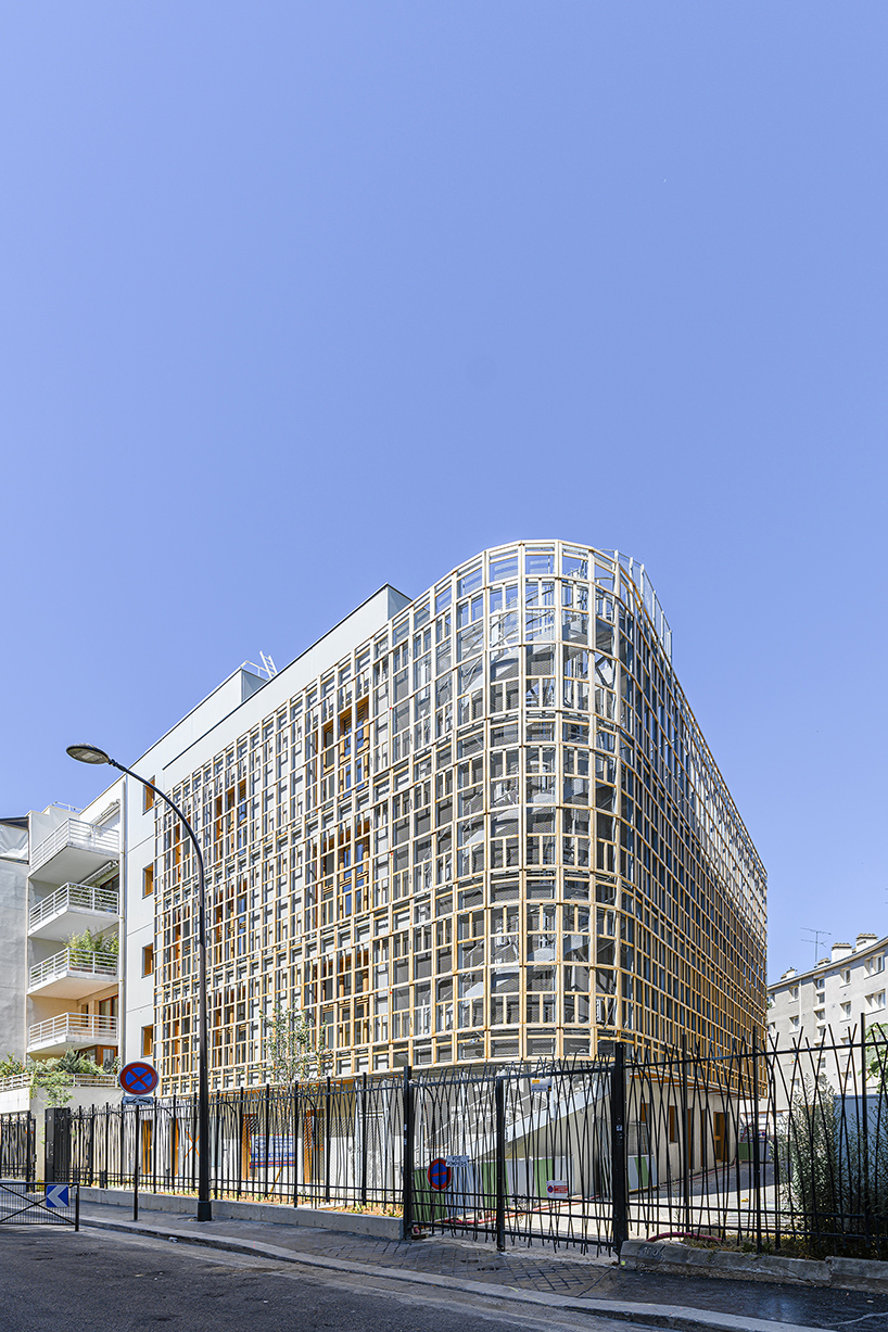 BFV architectes designs 'crèche justice' in paris using recycled door frames designboom