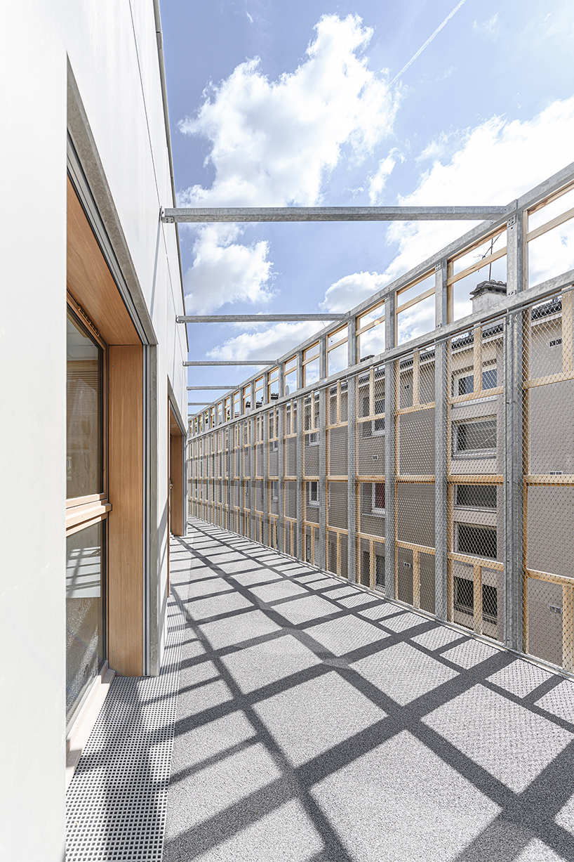 BFV architectes designs 'crèche justice' in paris using recycled door frames designboom