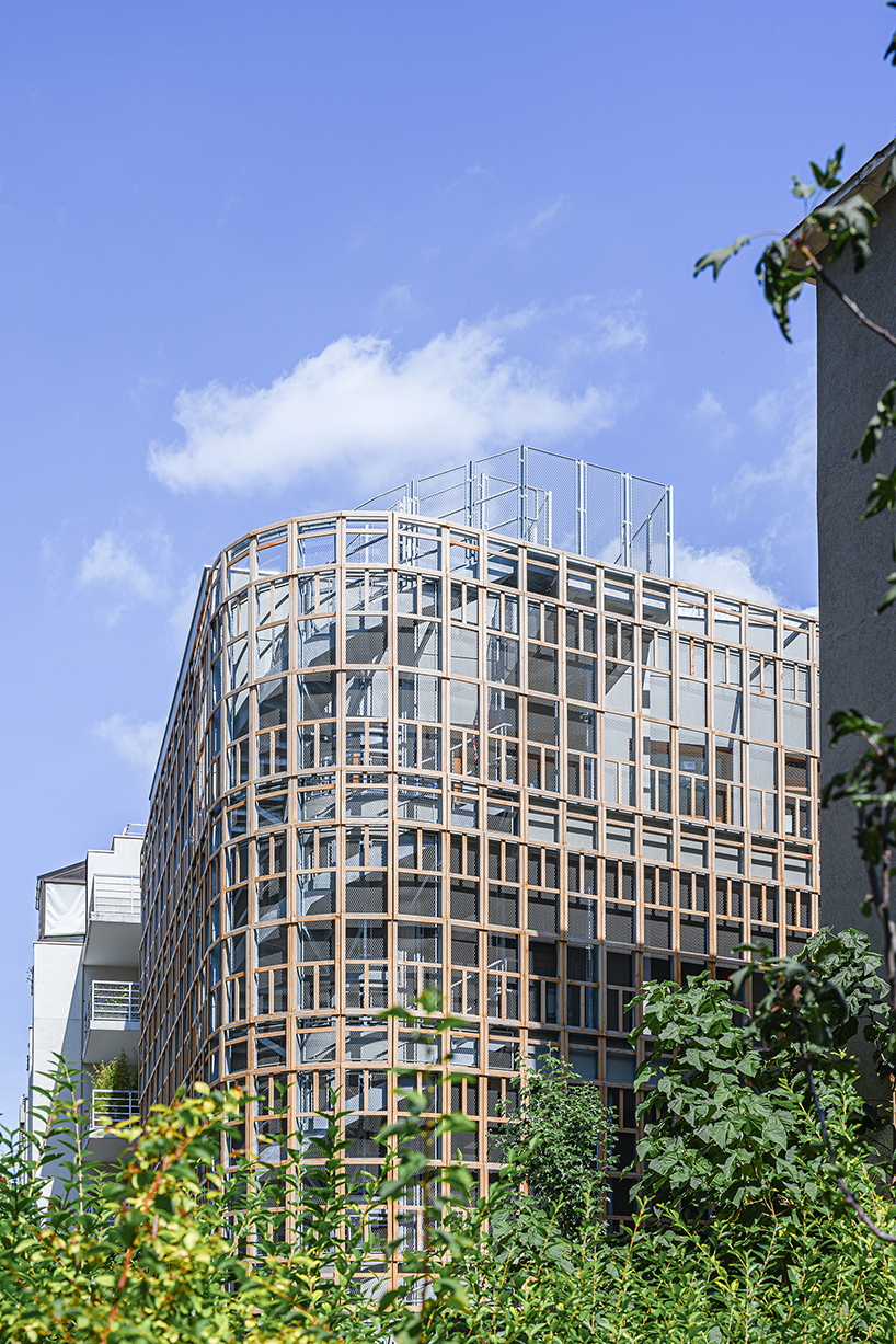 BFV architectes designs 'crèche justice' in paris using recycled door frames designboom