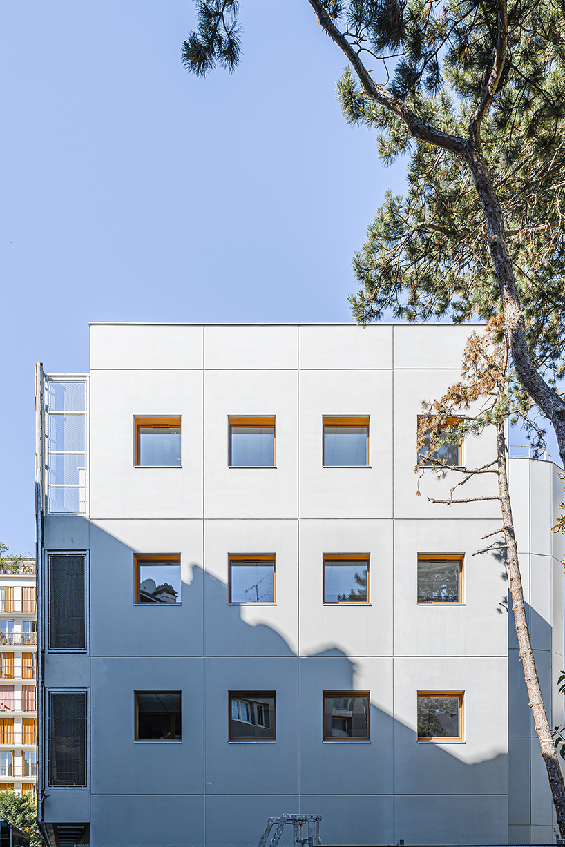 BFV architectes designs 'crèche justice' in paris using recycled door frames designboom
