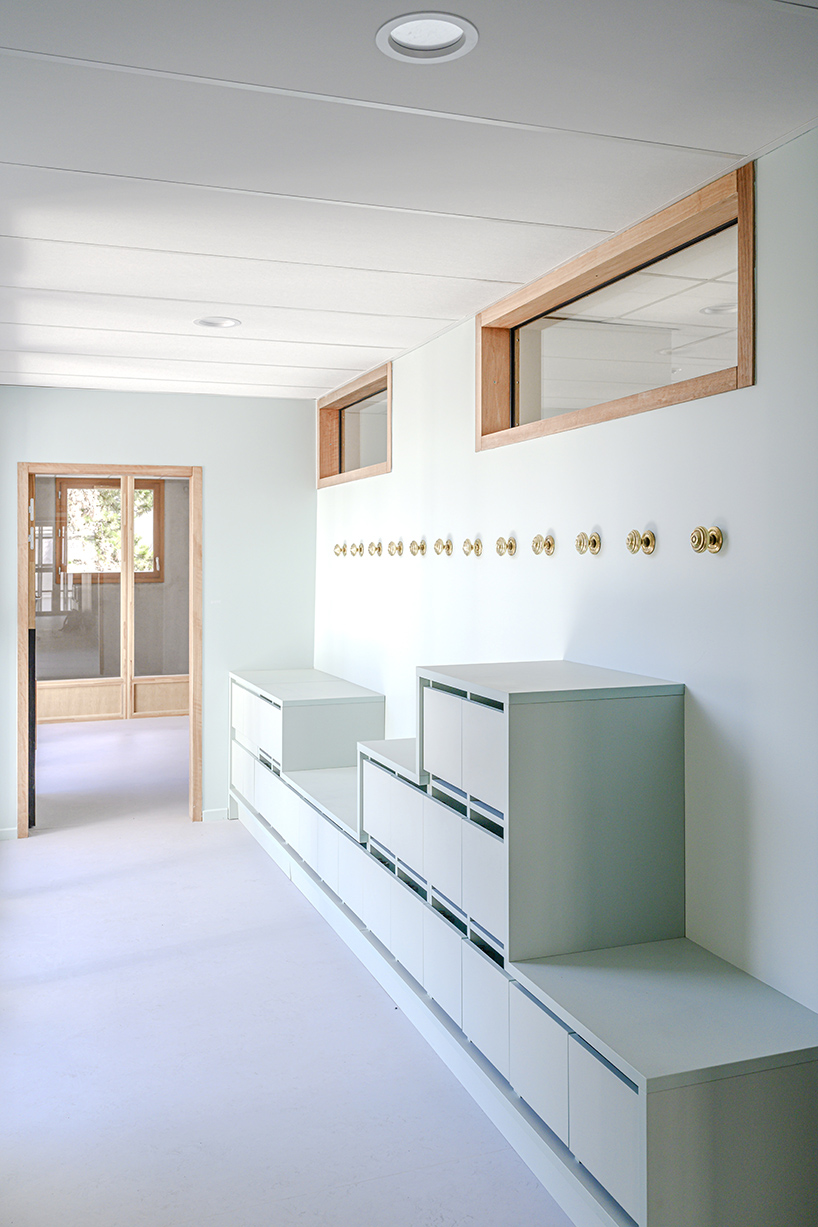 BFV architectes designs 'crèche justice' in paris using recycled door frames designboom