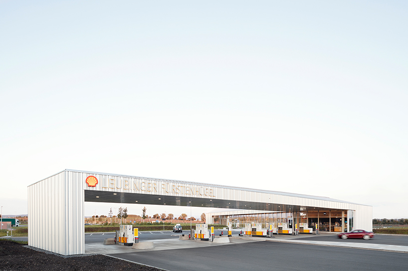MONO architekten unites service station with archaeological exhibition in german plains