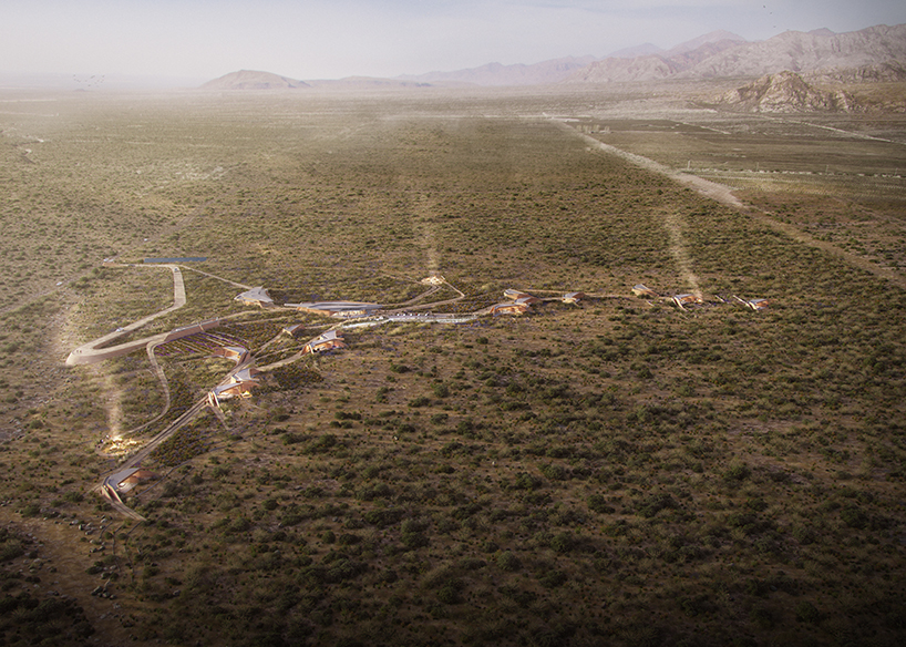 OF. studio designs 'eco-wine lodges' as a series of scattered rammed earth volumes