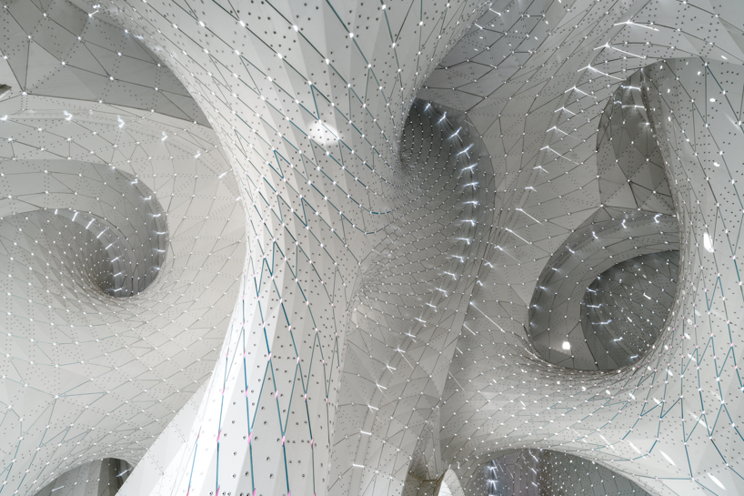 MARC FORNES / THEVERYMANY's cherry blossom pavilion invites play and rest in taiwan