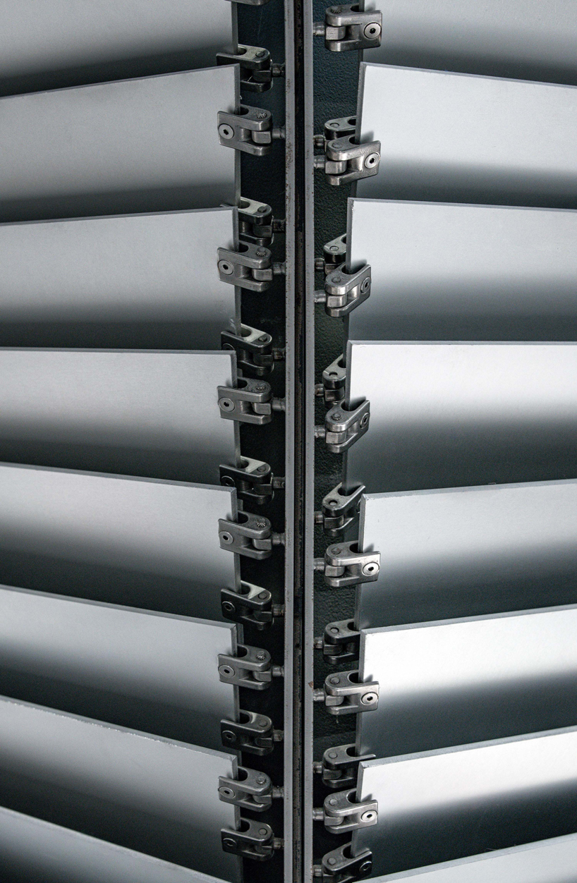 dongqi architects creates metal clad columns for concept store renovation in shanghai designboom