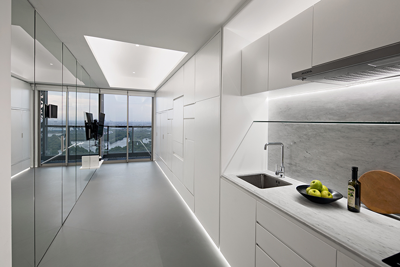 k-thengono installs adaptable built-in cabinets within 42sqm apartment in indonesia