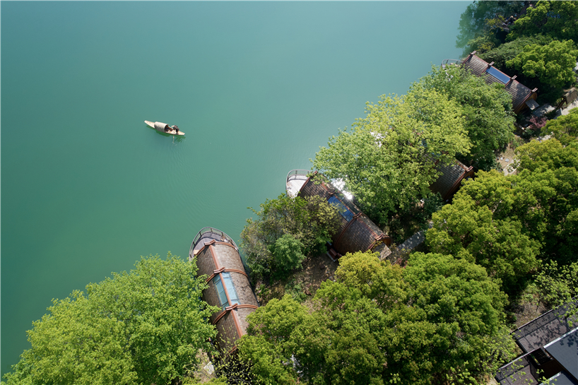 idyllic timber boat rooms are designed to 'float' on the fuchun river in china designboom