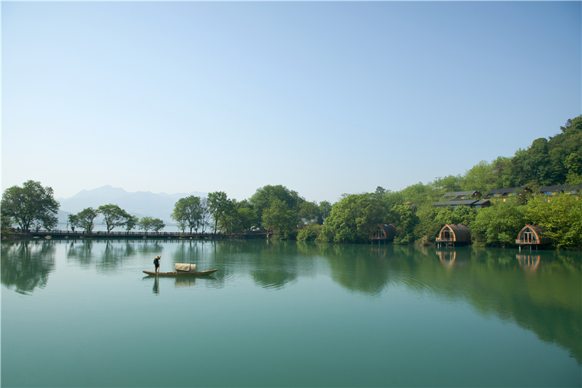 idyllic timber boat rooms are designed to 'float' on the fuchun river in china designboom