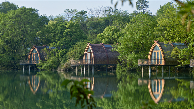 idyllic timber boat rooms are designed to 'float' on the fuchun river in china designboom