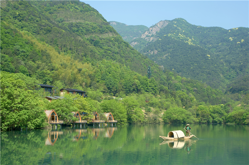 idyllic timber boat rooms are designed to 'float' on the fuchun river in china designboom