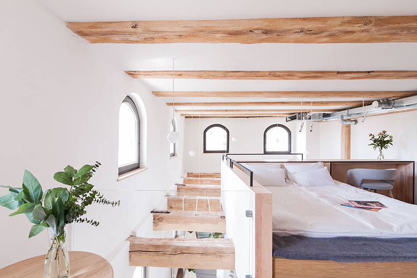 paweł tatara and znamy się transform baroque building into contemporary apartments in poland - 4