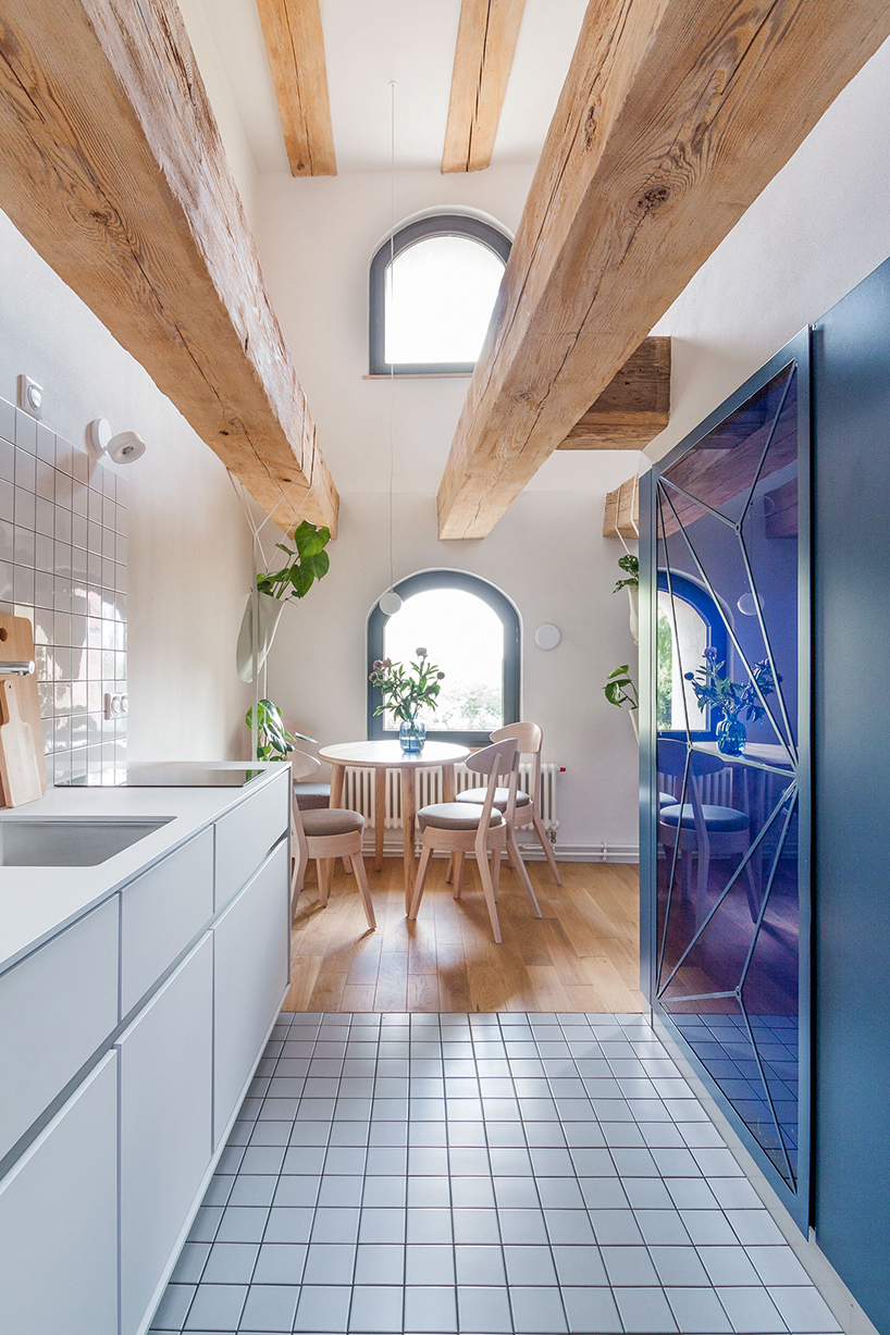paweł tatara and znamy się transform baroque building into contemporary apartments in poland - 9
