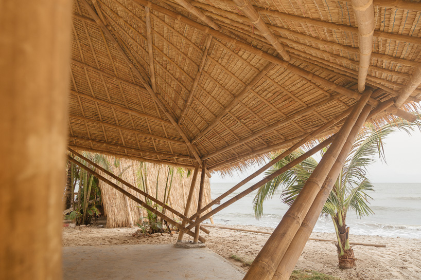 estudio cavernas builds a beach getaway using bettle nut palm trunks and bamboo on the shores of cambodia 10