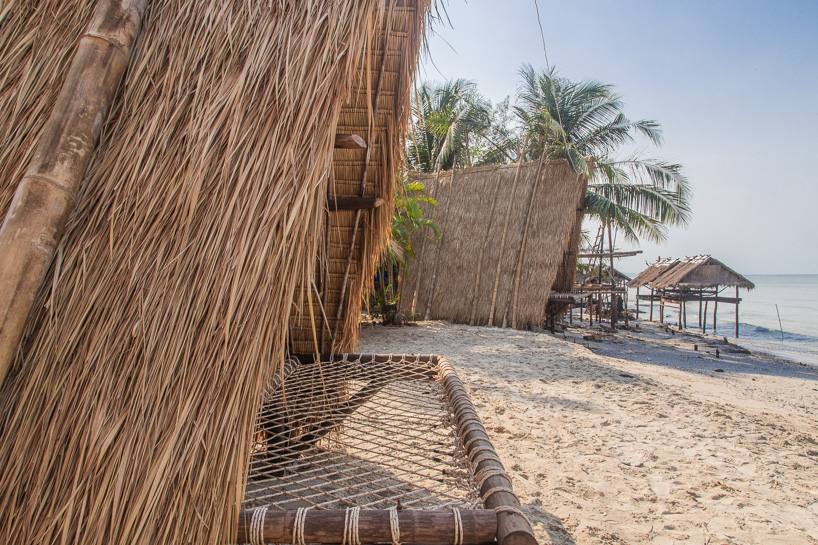 estudio cavernas builds a beach getaway using bettle nut palm trunks and bamboo on the shores of cambodia 2