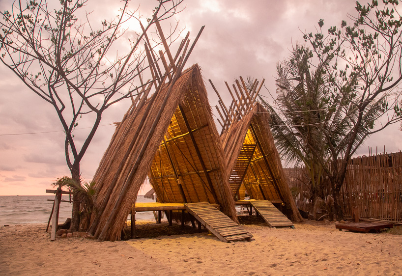estudio cavernas builds a beach getaway using bettle nut palm trunks and bamboo on the shores of cambodia 4