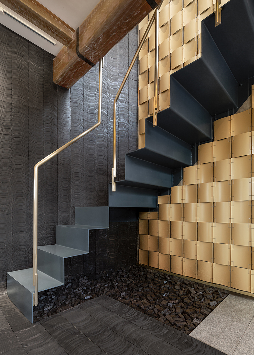 atelier tree brings life to beijing storefront with golden heart installation - 2