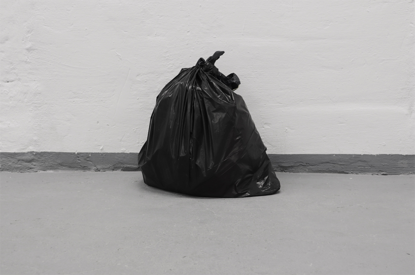 the krank installs 500 plastic trash bags in berlin to highlight our consumerist society designboom
