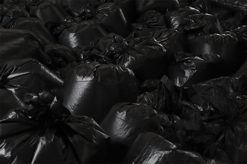 the krank installs 500 plastic trash bags in berlin to highlight our consumerist society designboom