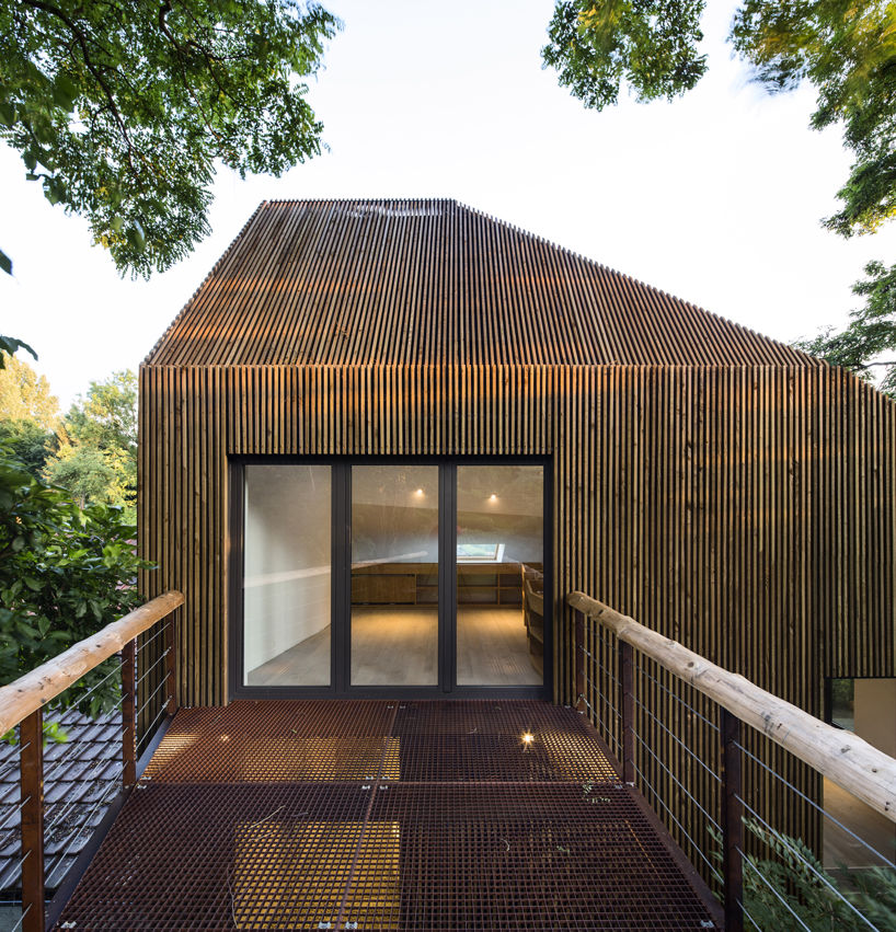 louis paillard adds wood-clad extension to 19th-century house in waterloo, belgium