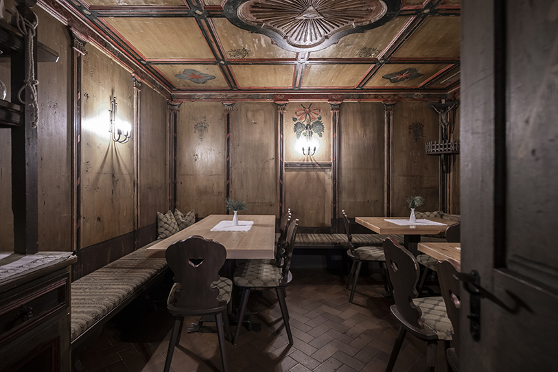 plasma studio's revamped restaurant encapsulates traditional alpine living in italian dolomites