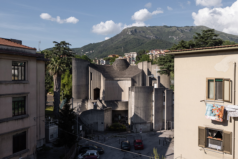 ste murray captures brutalist curves and rings of sacra famiglia church in italy as it turns 50