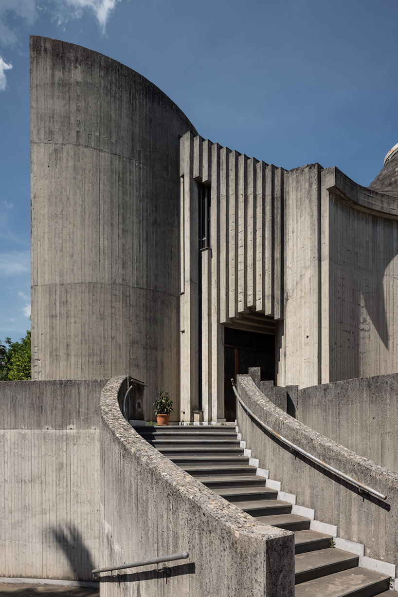 ste murray captures brutalist curves and rings of sacra famiglia church in italy as it turns 50