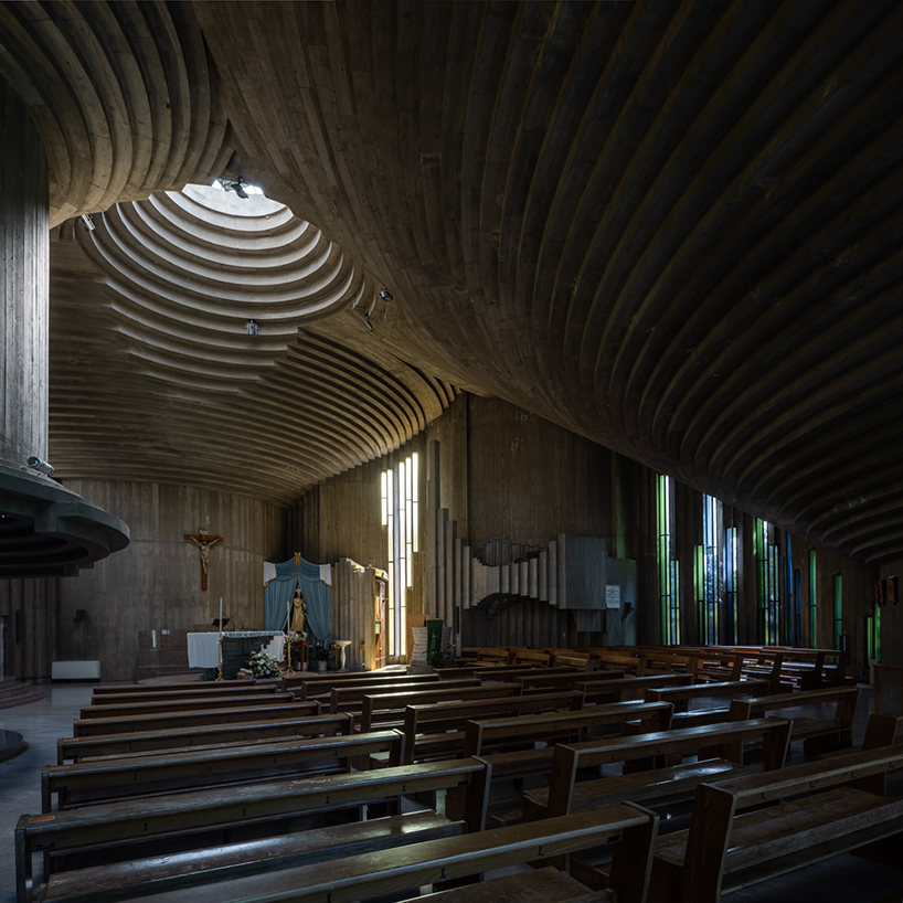 ste murray captures brutalist curves and rings of sacra famiglia church in italy as it turns 50