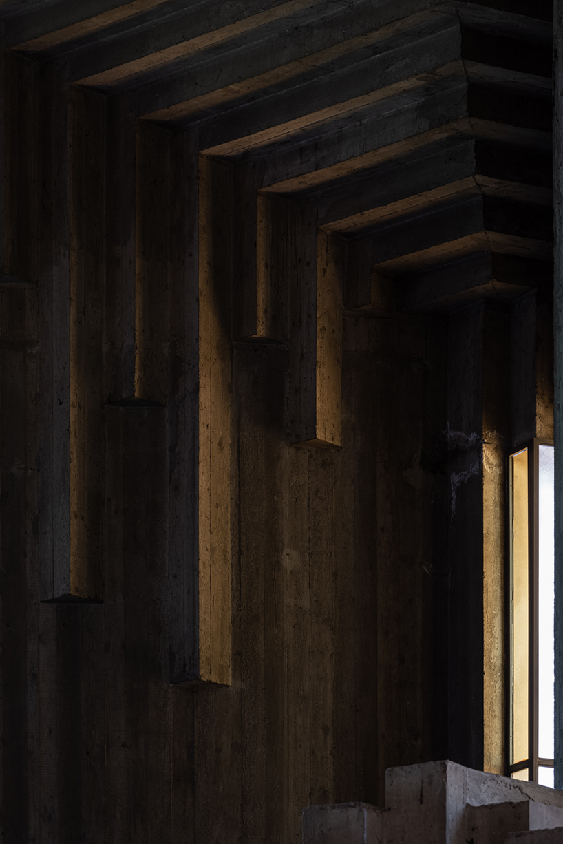 ste murray captures brutalist curves and rings of sacra famiglia church in italy as it turns 50