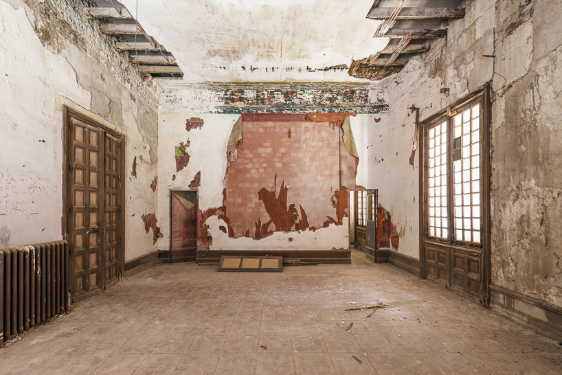 romain veillon captures the faded interiors of château laurens in france designboom