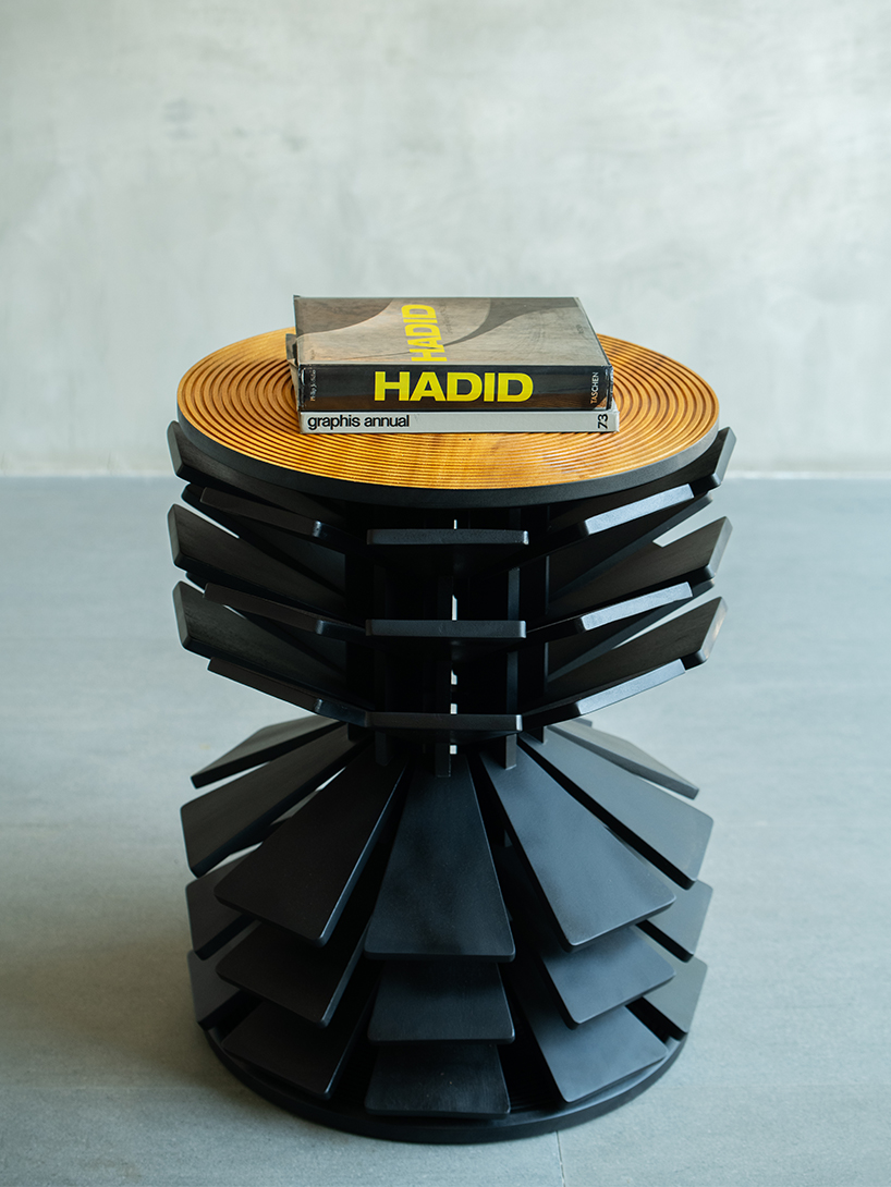 salù iwadi studio layers spiraling wooden fins to form zangbeto side table - 4