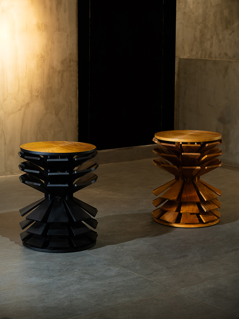 salù iwadi studio layers spiraling wooden fins to form zangbeto side table - 9