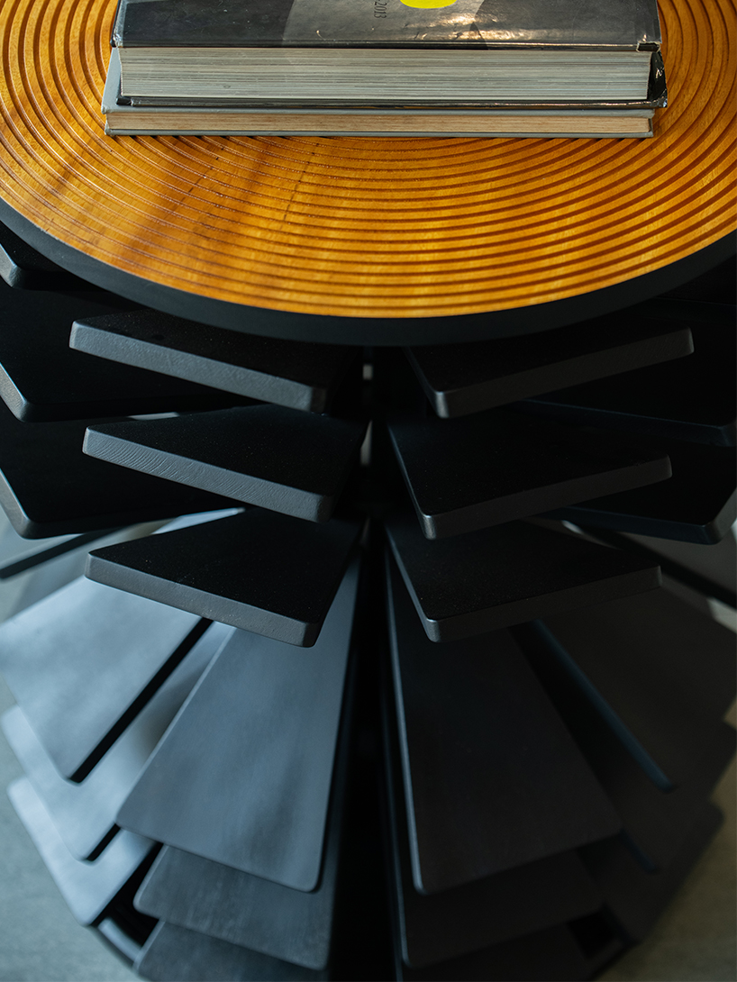 salù iwadi studio layers spiraling wooden fins to form zangbeto side table - 6