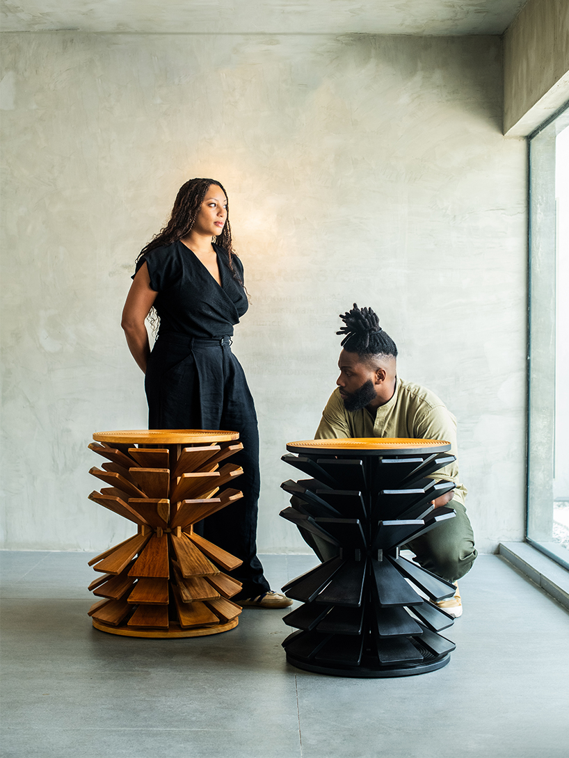 salù iwadi studio layers spiraling wooden fins to form zangbeto side table - 8