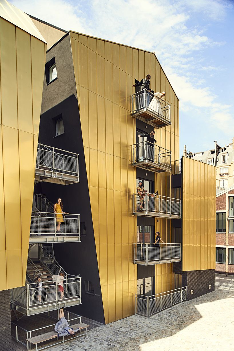golden standing seam panels clad metek architecture's social housing project in paris designboom