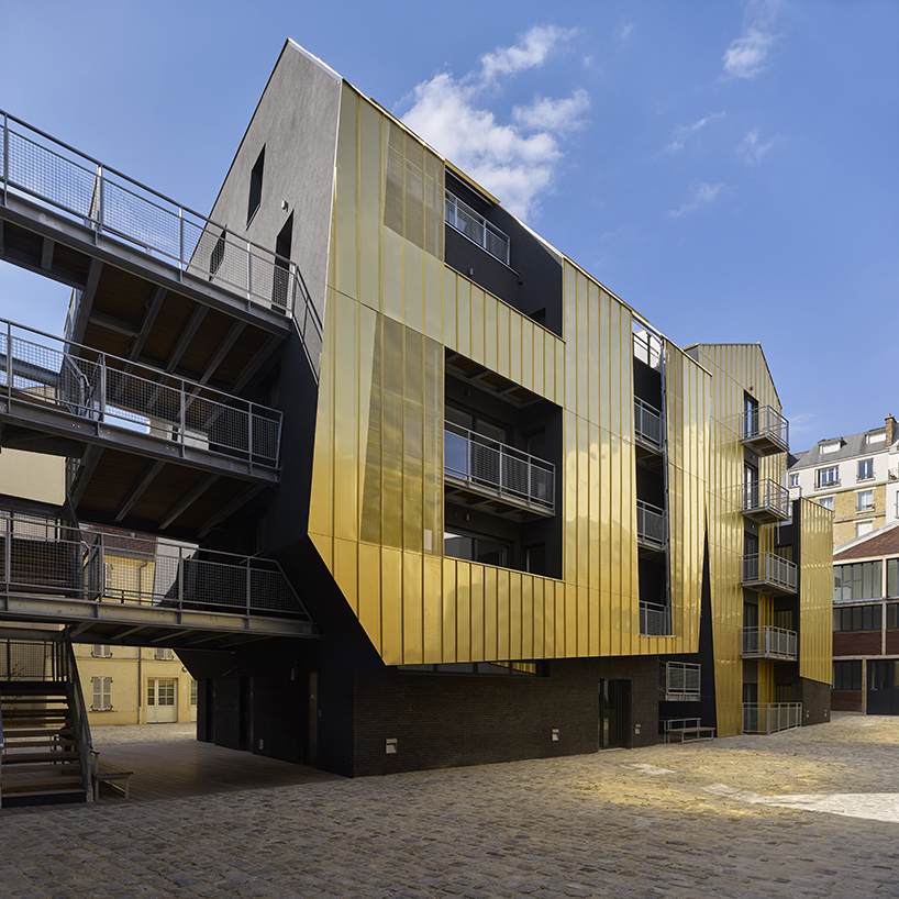golden standing seam panels clad metek architecture's social housing project in paris designboom