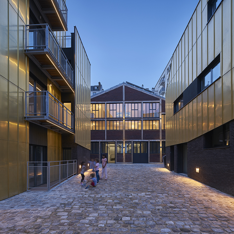 golden standing seam panels clad metek architecture's social housing project in paris designboom