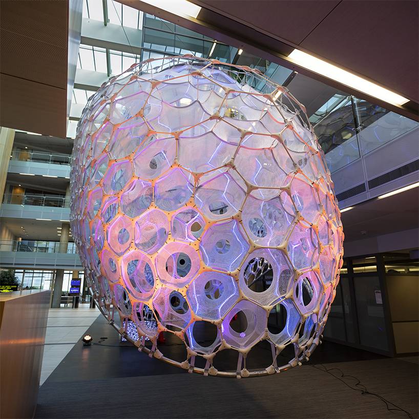 ada by jenny sabin is an installation that translates people's expressions into light and color designboom