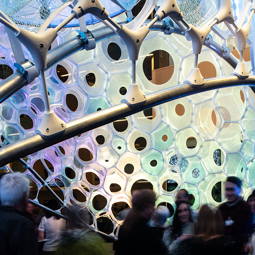 ada by jenny sabin is an installation that translates people's expressions into light and color designboom