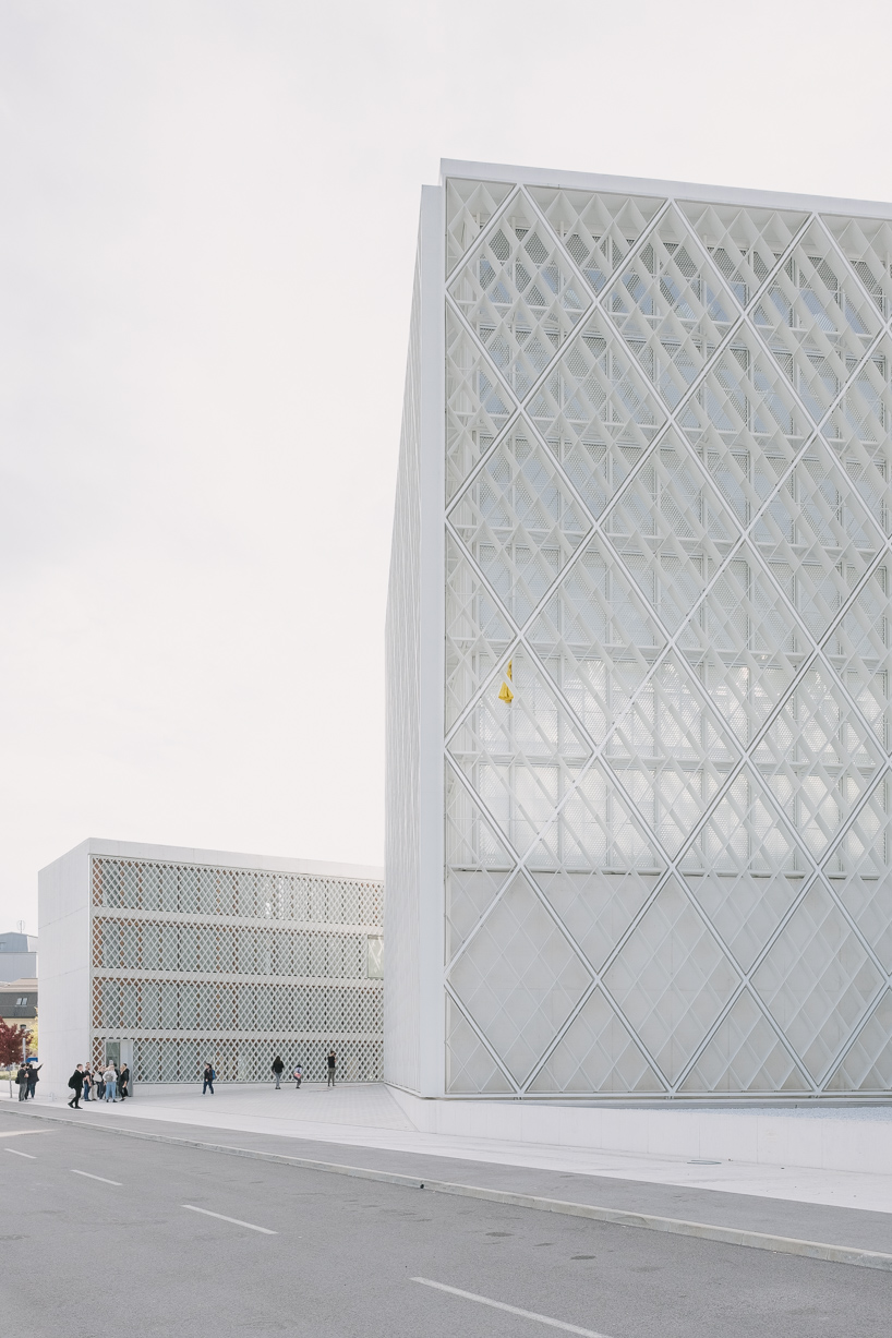 guilherme da rosa captures the clean white lines of bevk perović's ljubljana islamic center designboom