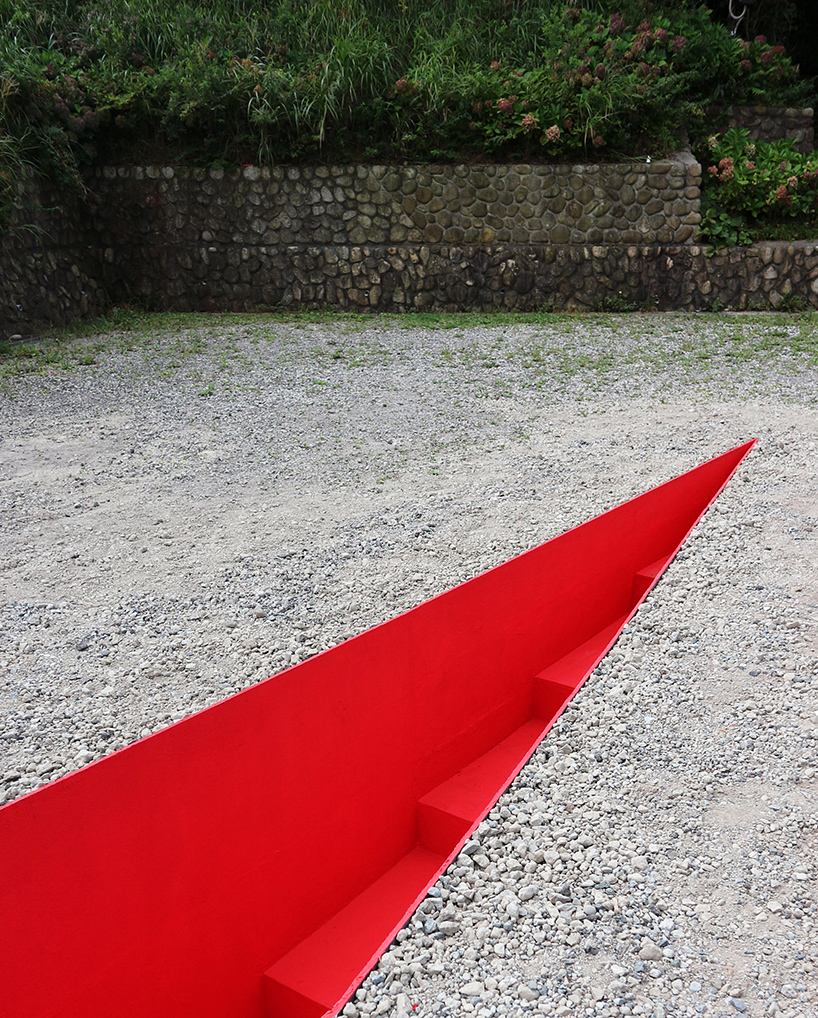 a red wound cuts the earth for hajime yoshida + yoshihiro mikami's land art in japan - 1