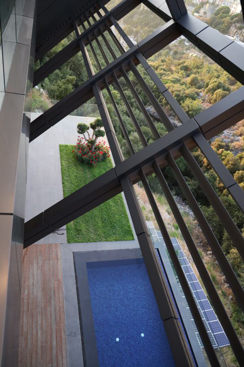 DAZARCHITECTS designs a family house to step into a cliffside in lebanon designboom