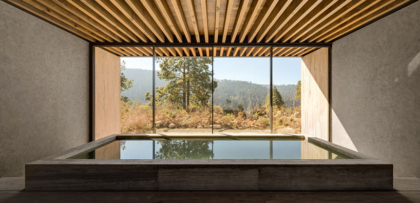 hill house is located in a wooded area on one of the slopes of a ravine taking advantage of the visuals offered by the environment generating a semi buried platform by manuel cervantes estudio 8