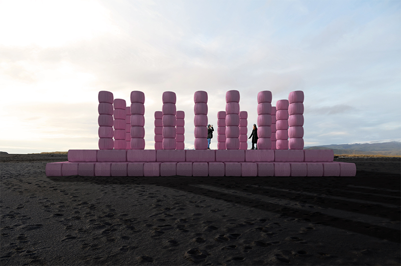 tobia zambotti stacks pink hay bales in rural iceland to raise awareness of breast cancer designboom